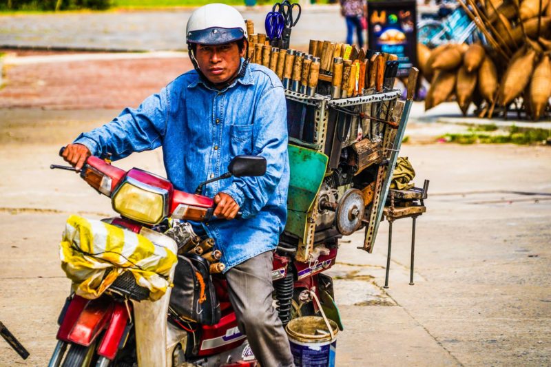 Knife sharpener on motorbike in Vietnam