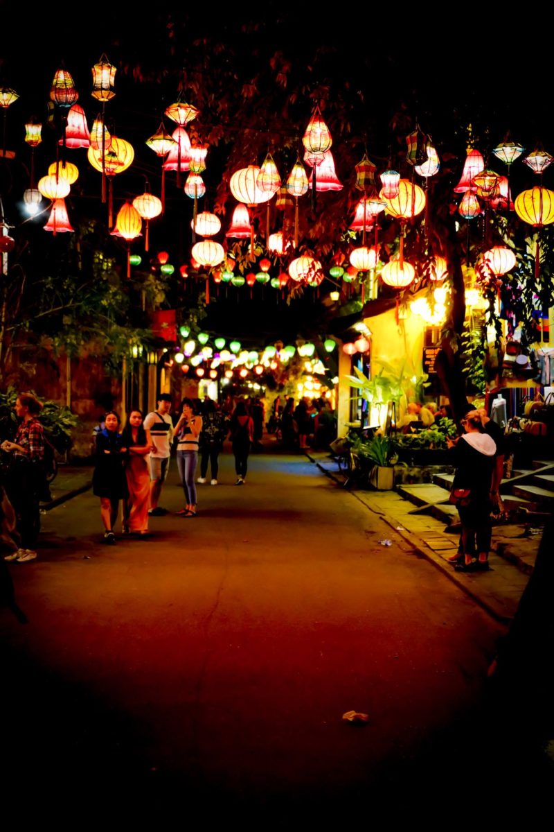 Night time street scene in Huey with lanterns