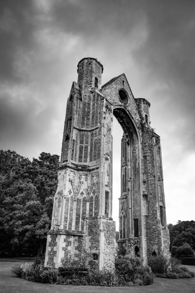 Ruins of Walsingham Abbey with stormy sky